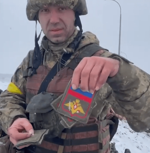 Ukrainian Soldier Showed Stripes Of Killed Russian Servicemen
