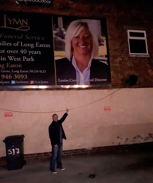 Mick sent a date - then a picture of himself standing under a terrace billboard pointing at Louis.