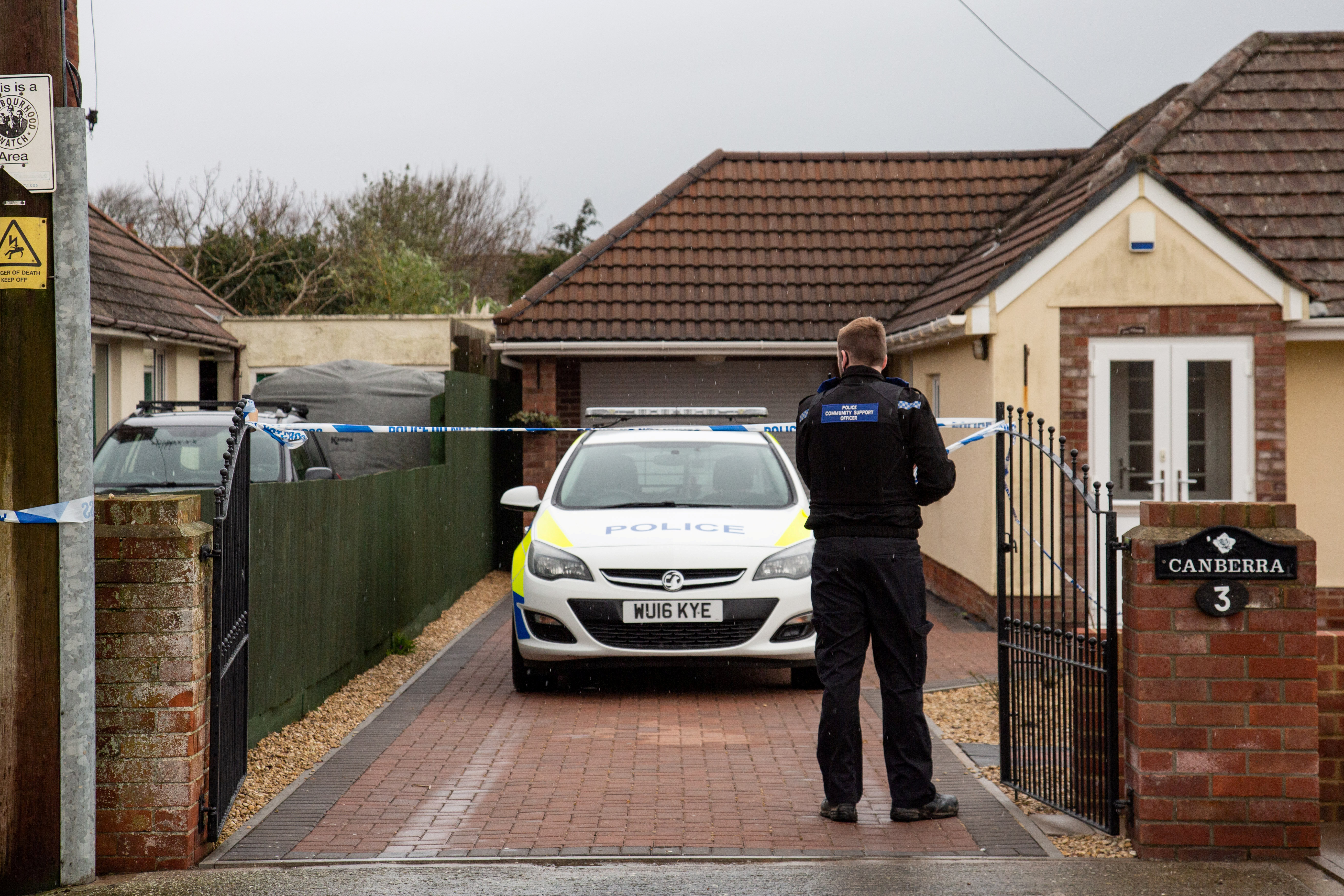 Police took a photo outside Jackson's home in Somerset.